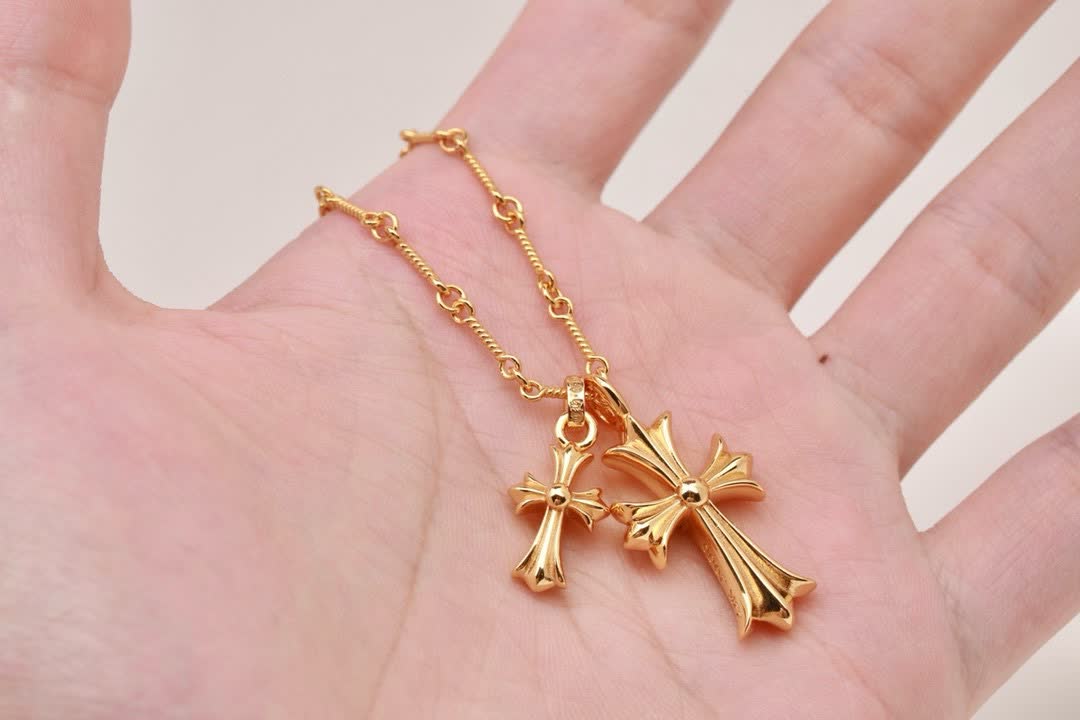 Chrome Hearts Gold Cross Pendant with Pink Stones